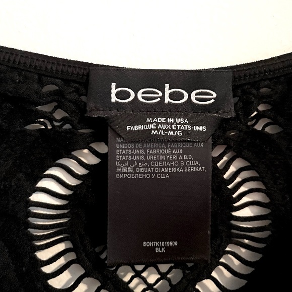 New Bebe Black Bodycon Black Dress with short Sleeves and cut out details - Picture 6 of 9